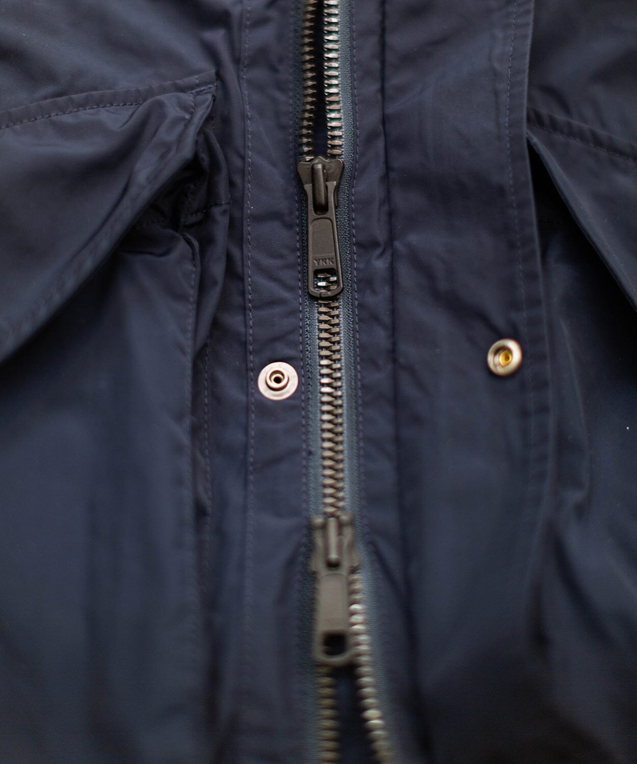 navy blue lightweight rain jacket by oobe brand