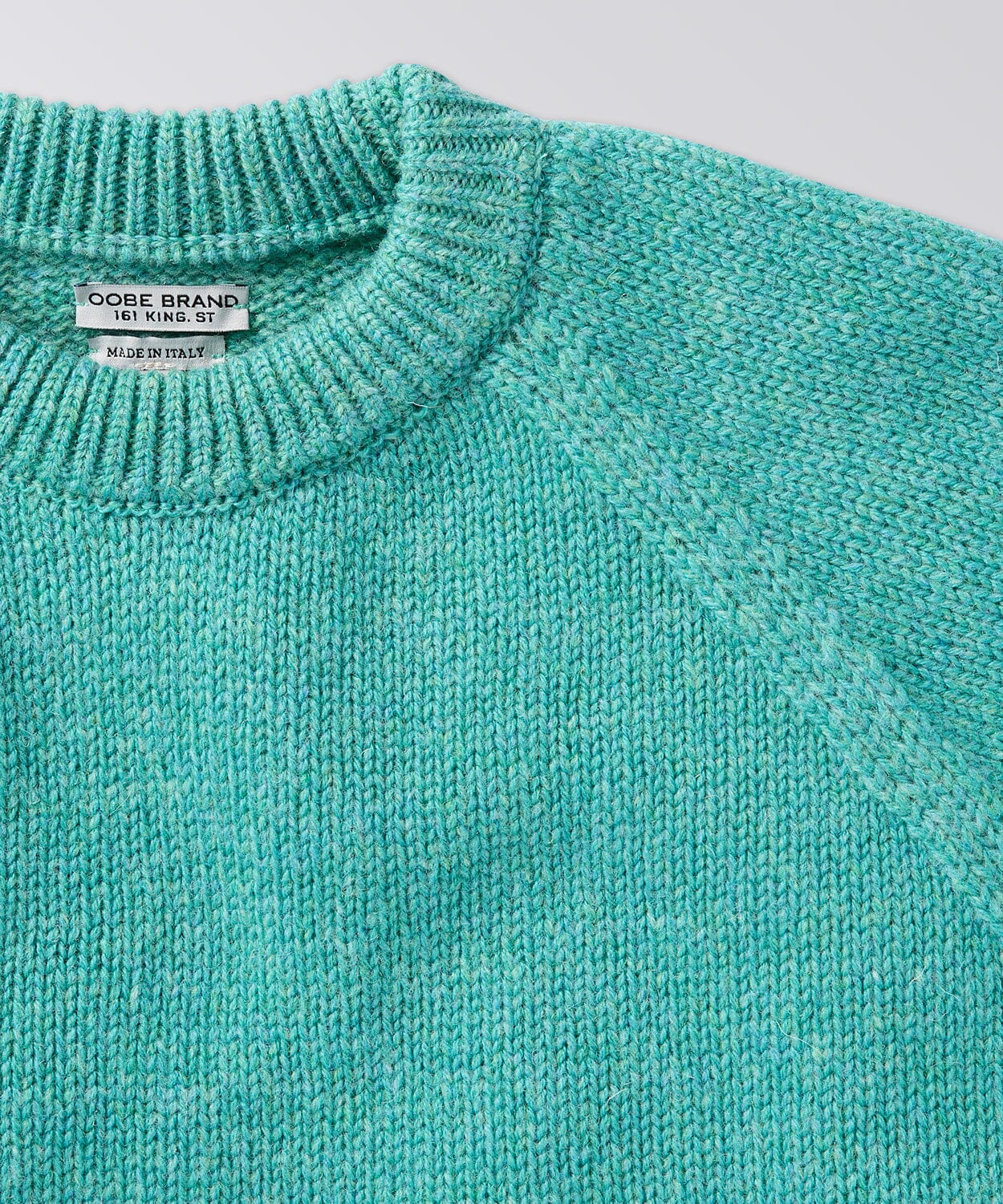 front of a mens crew neck sweater