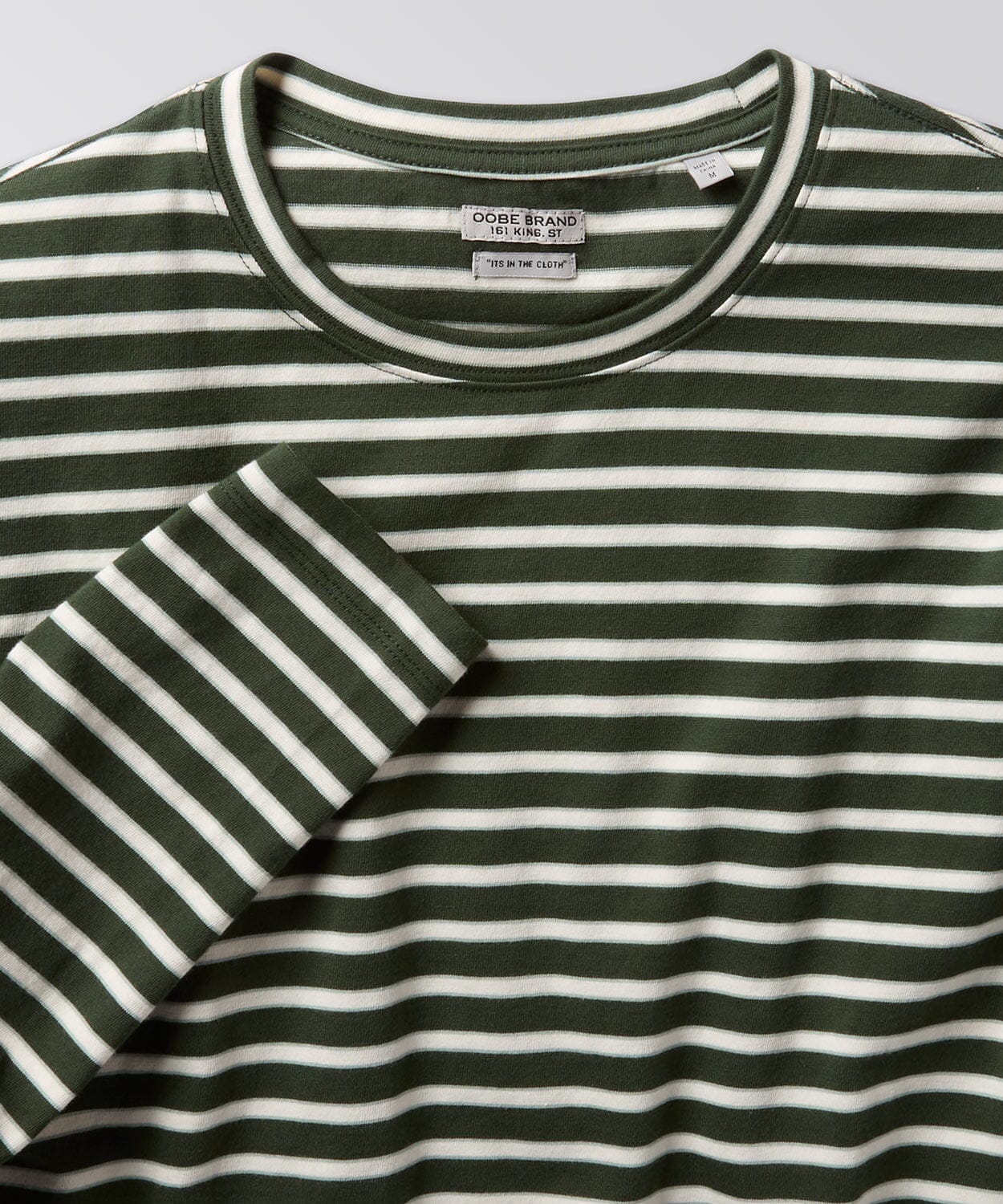 front of a mens striped tee