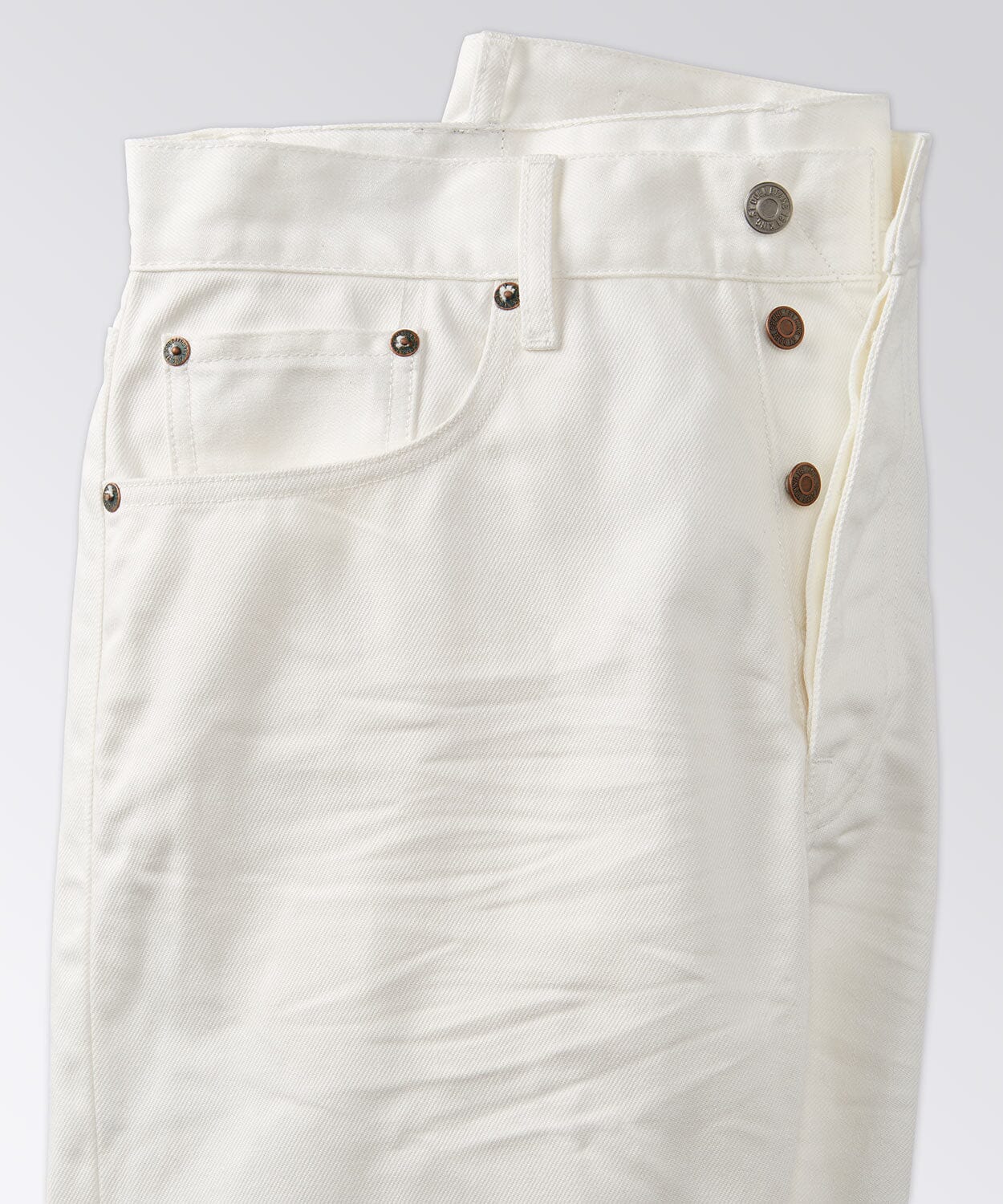 side of mens button jeans