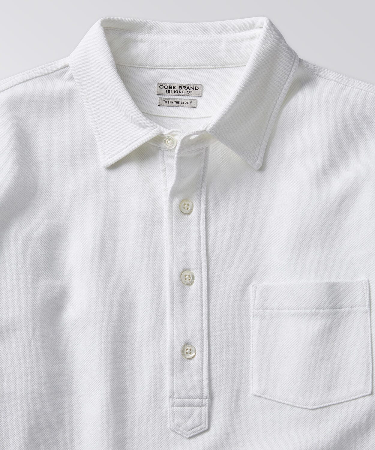 front of a polo shirt