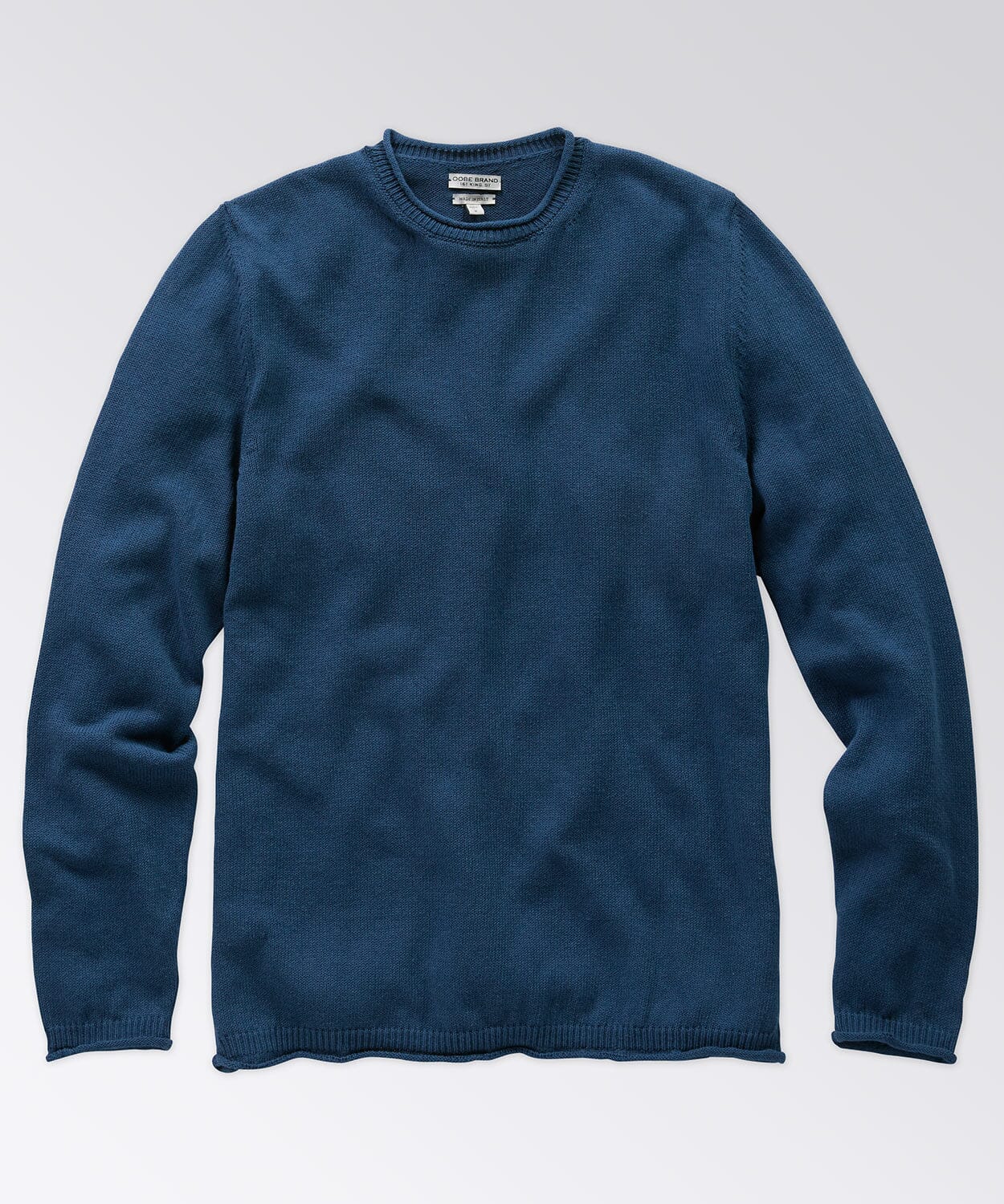 Crew neck sweater with raw edges