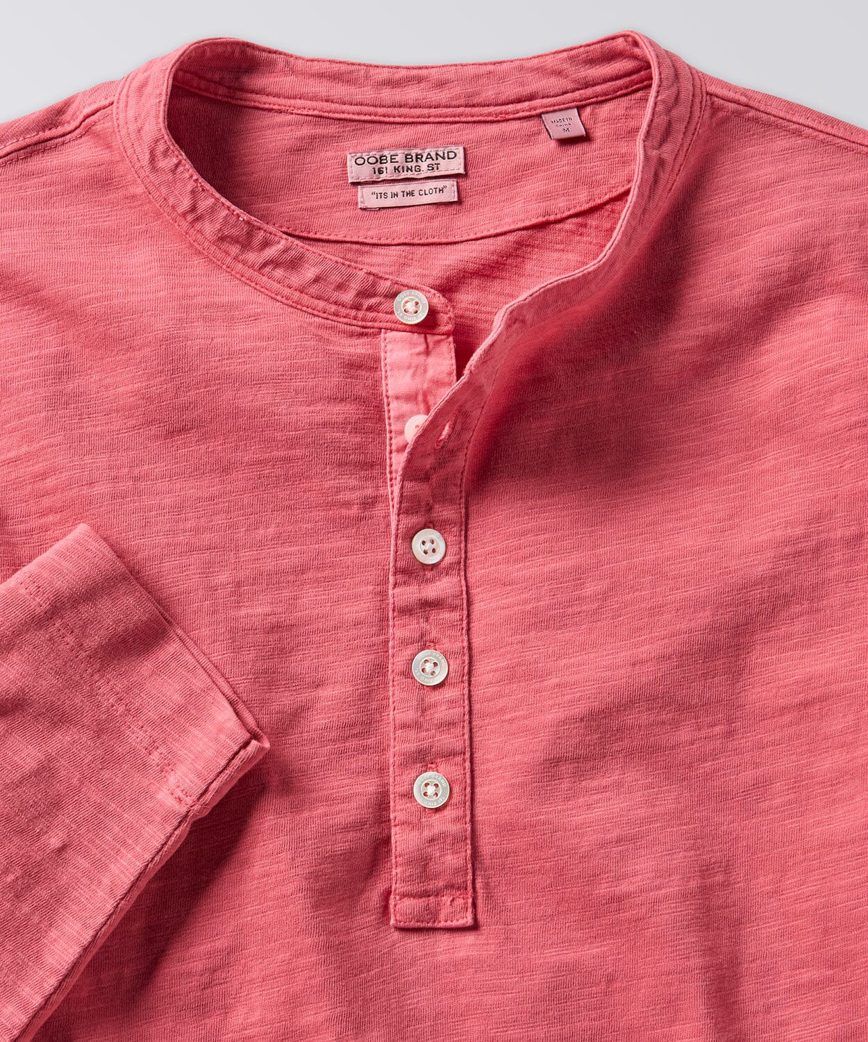 front of a mens henley shirt