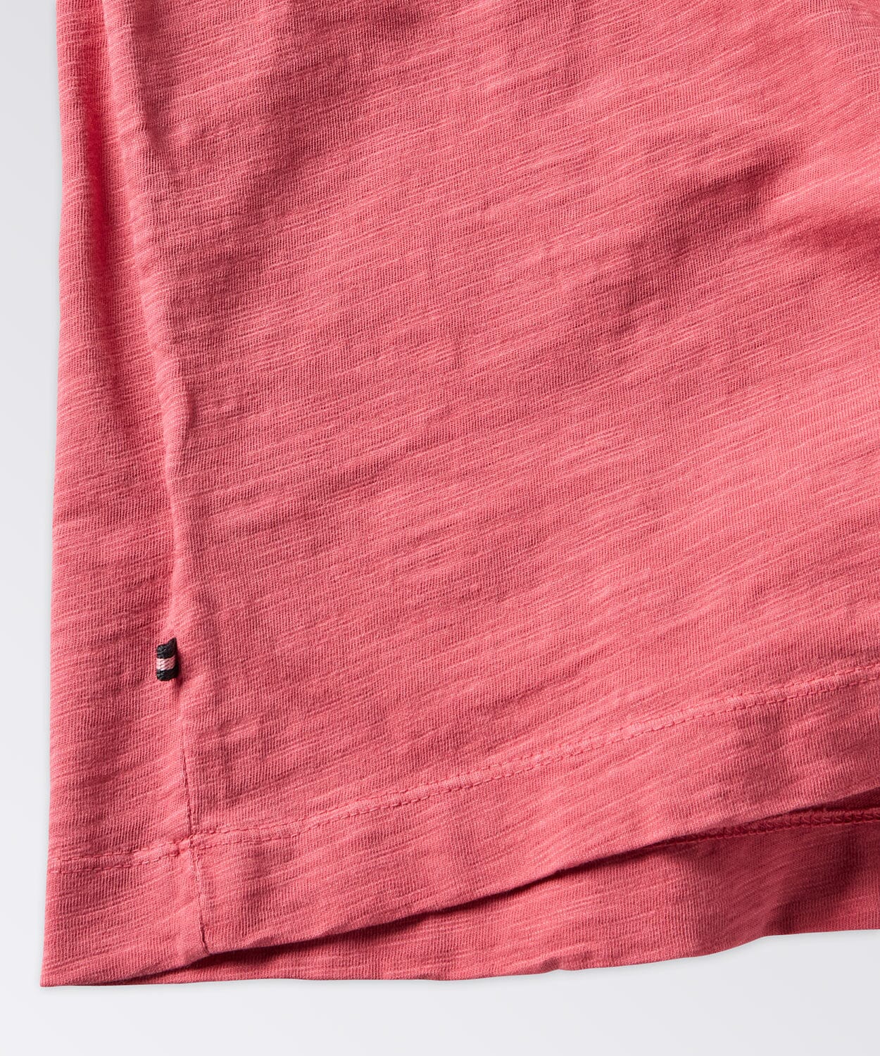 detail of a mens henley shirt