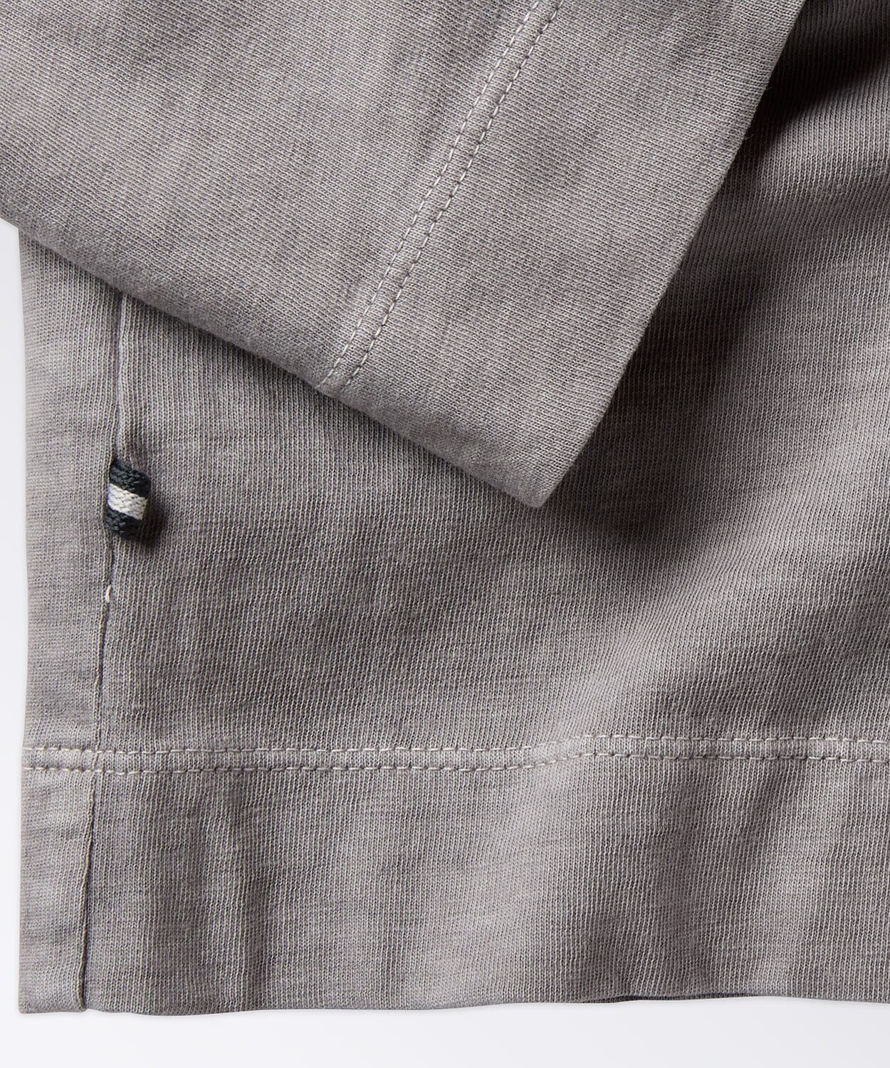 detail of a mens henley shirt