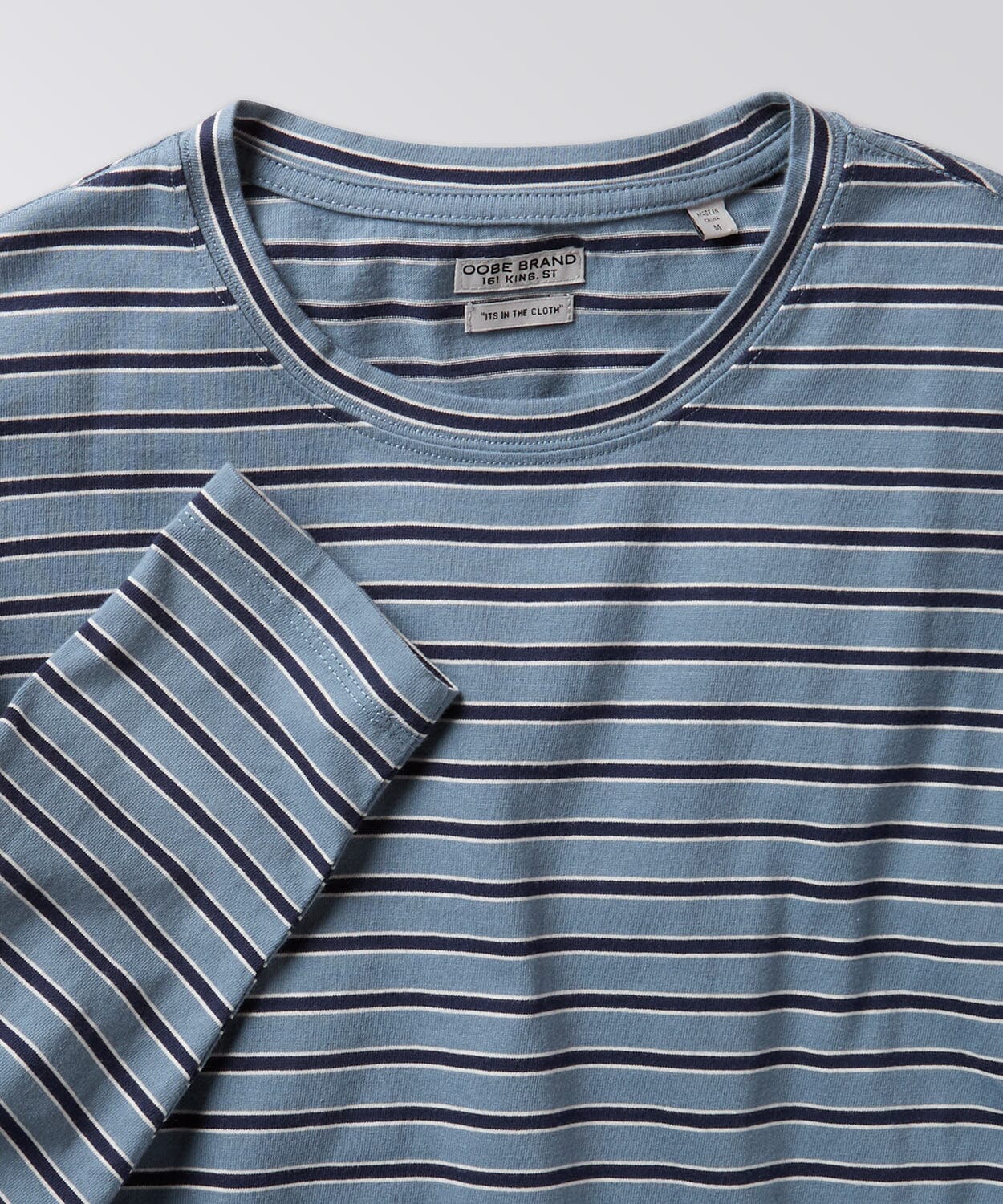 front of a mens striped tee