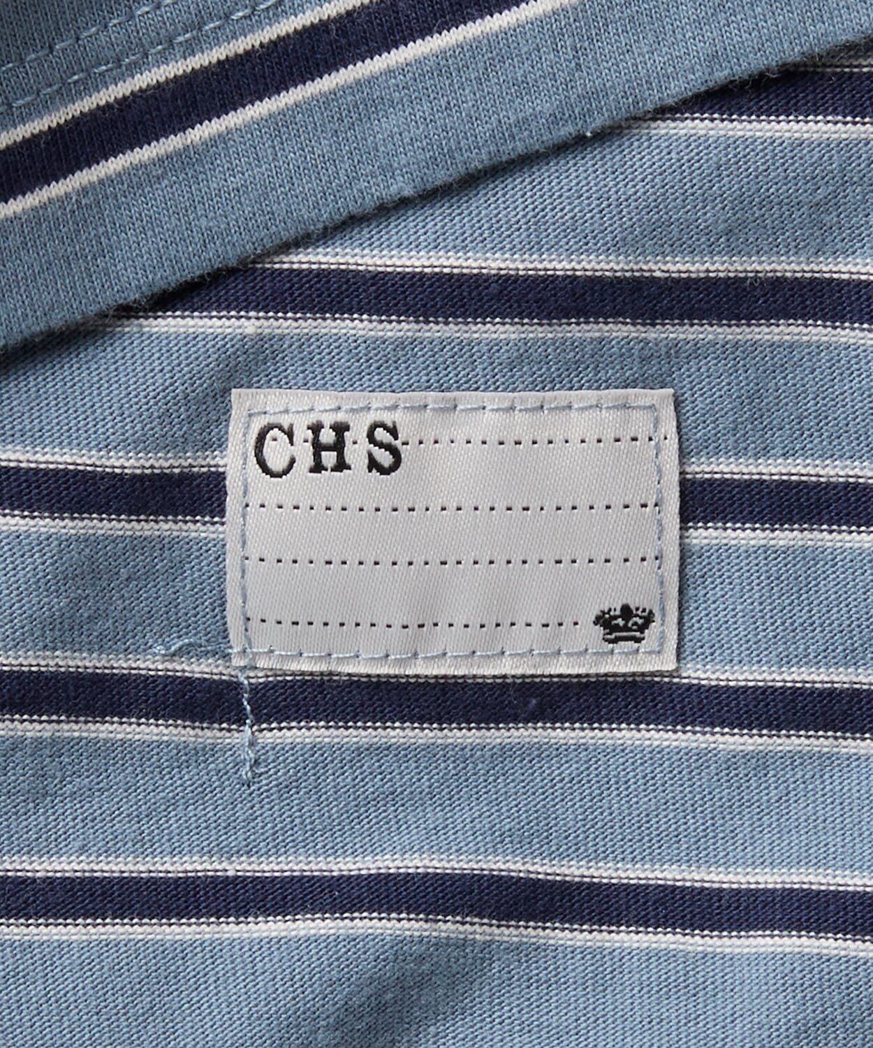 detail of a mens striped tee