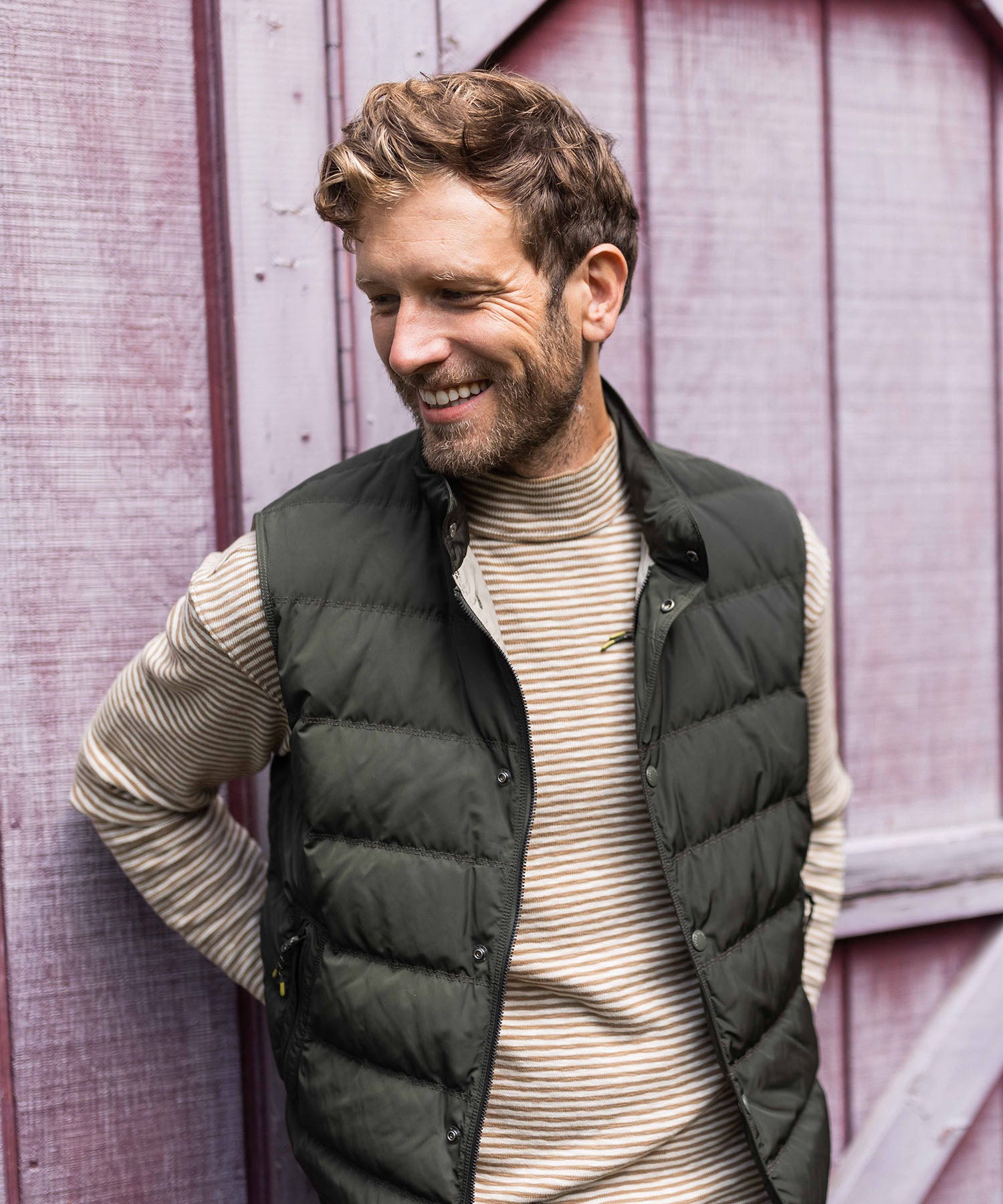 man wearing an oobe brand quilted vest