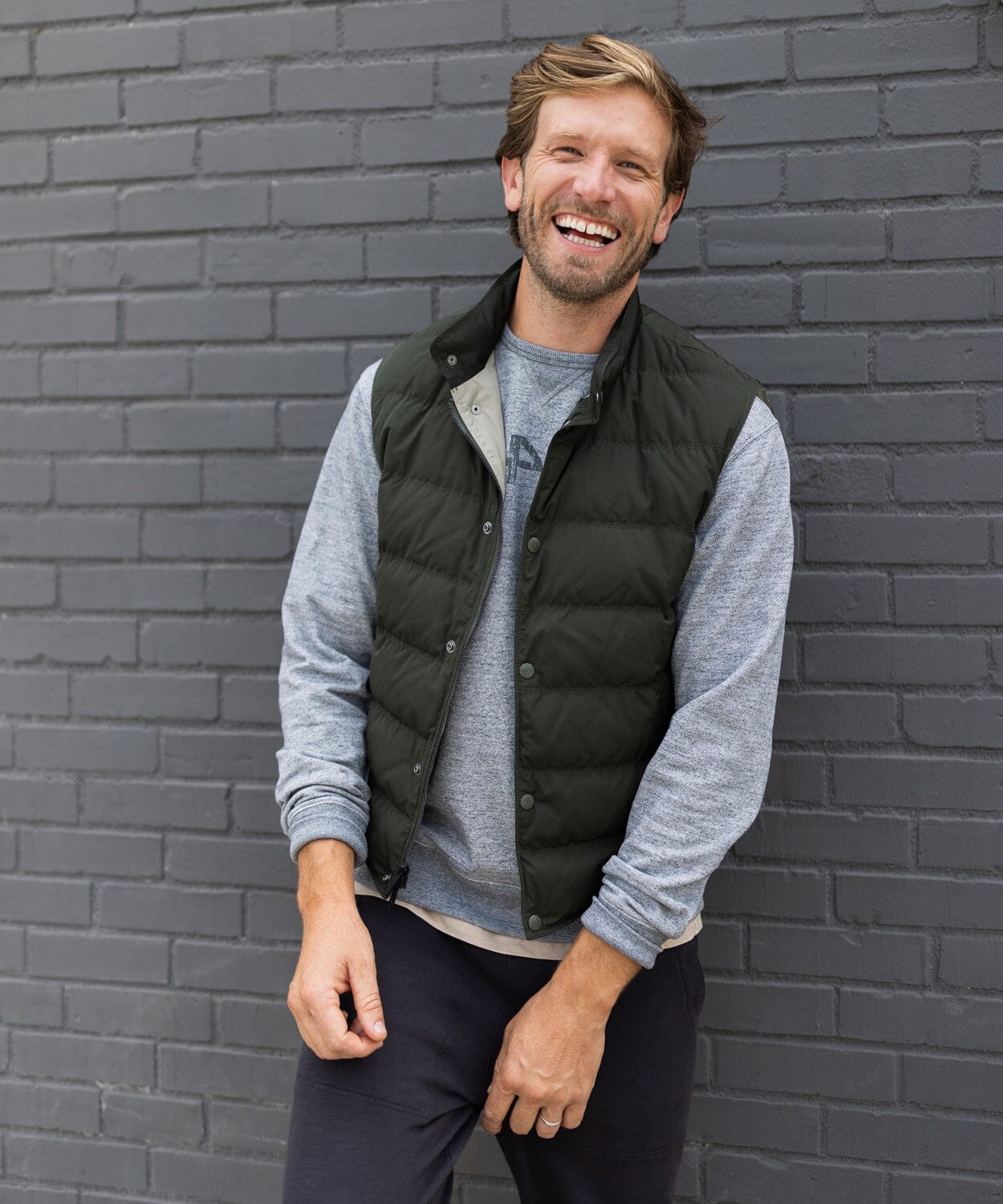 Grey crew pullover with 29401 Charleston zip code across chest under an olive vest - OOBE BRAND