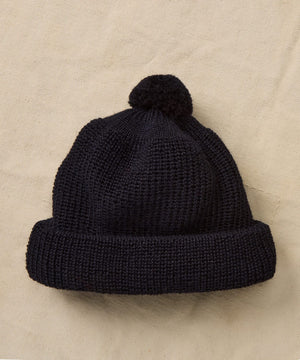 Wool beanie with pom pom on top