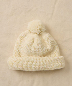 Wool beanie with pom pom on top 