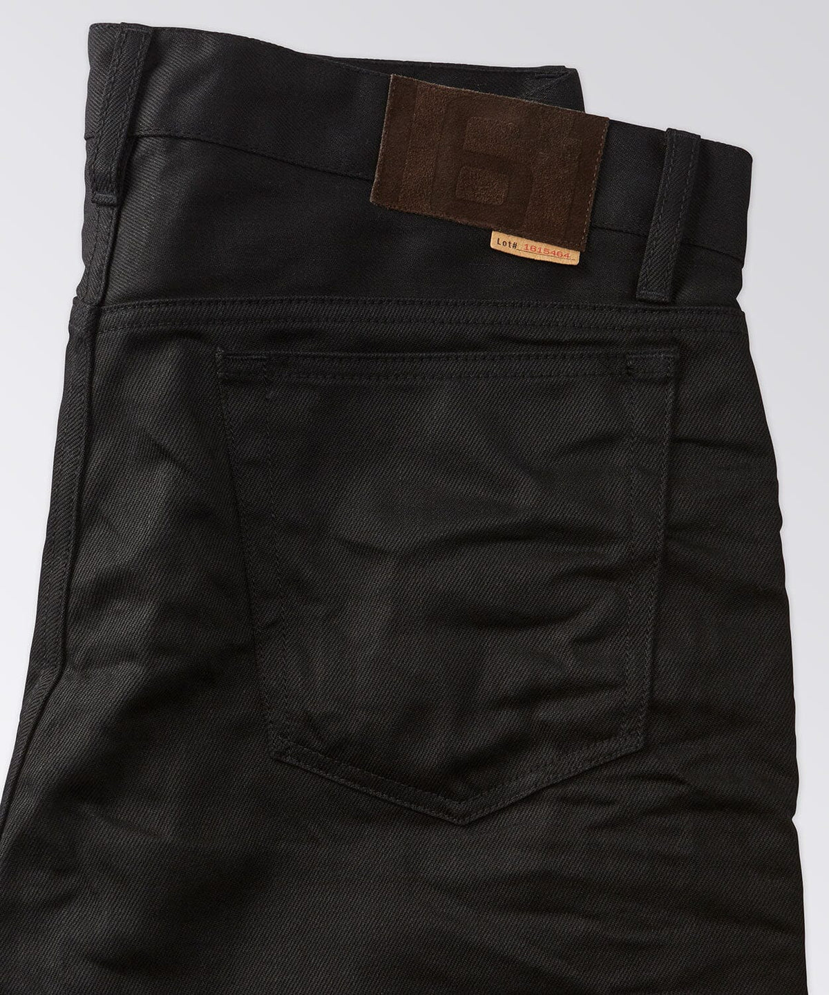 back of mens button jeans