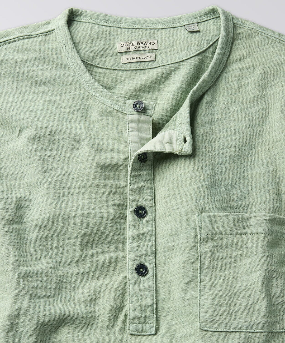 front of a mens henley shirt