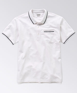 front of a white polo shirt