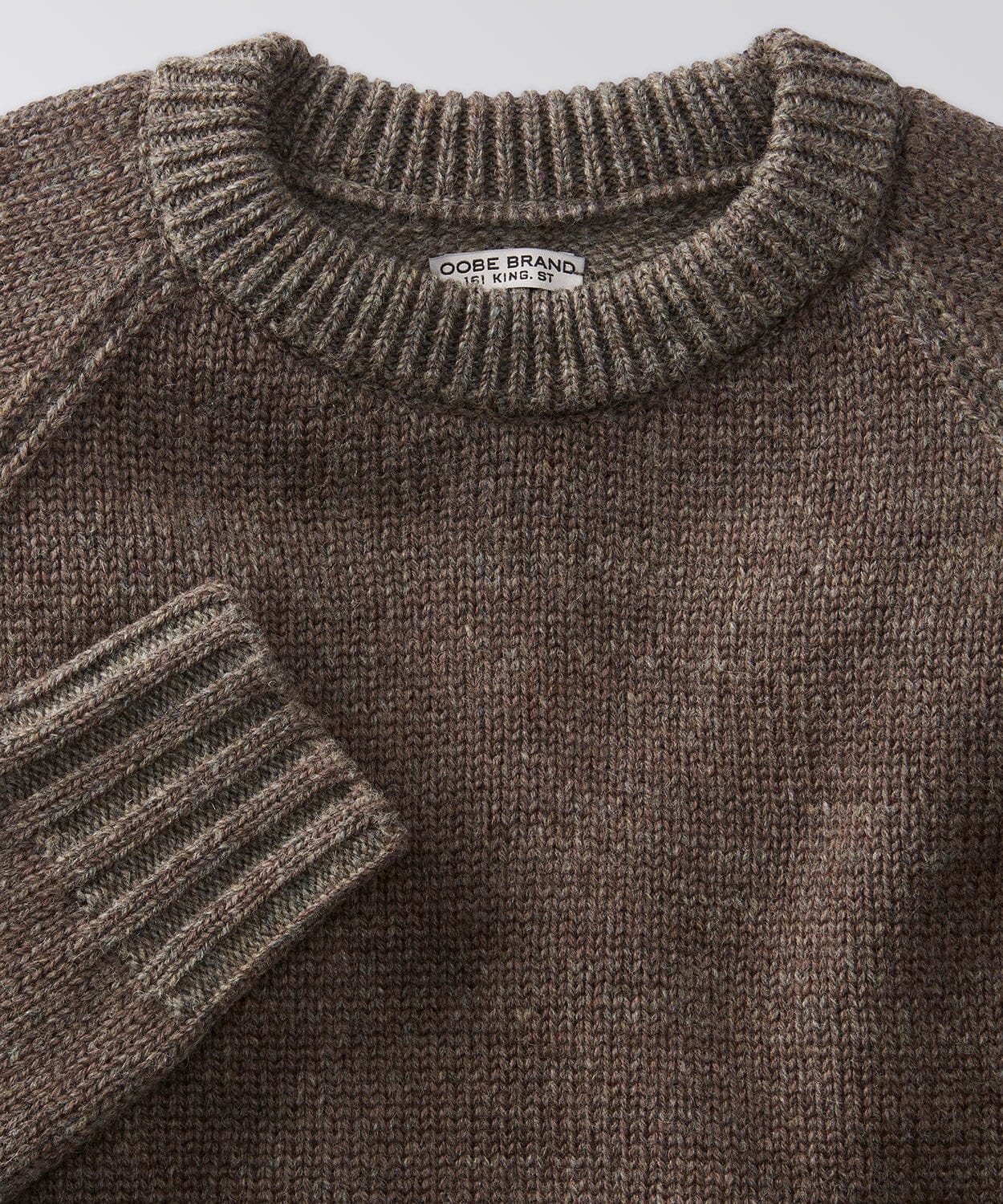 front of a mens crew neck sweater