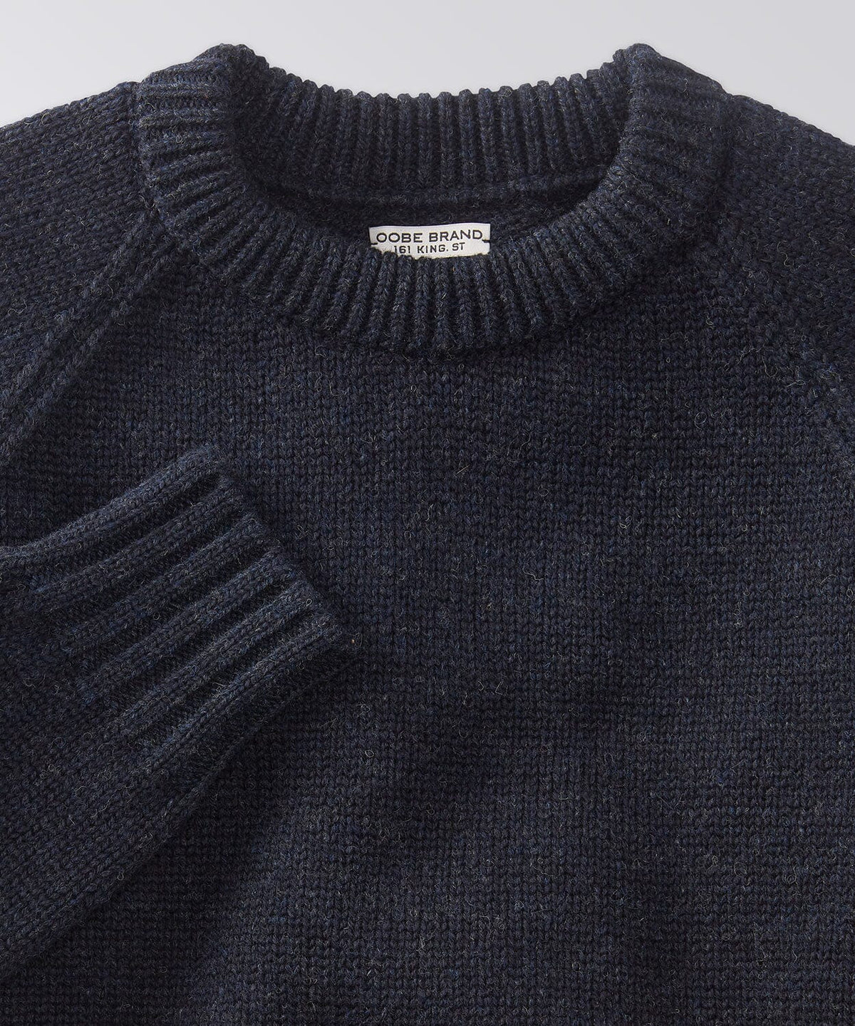 front of a mens crew neck sweater