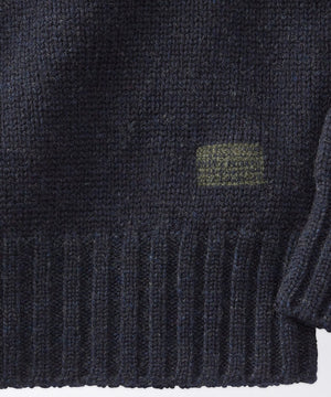 sleeve of a mens crew neck sweater