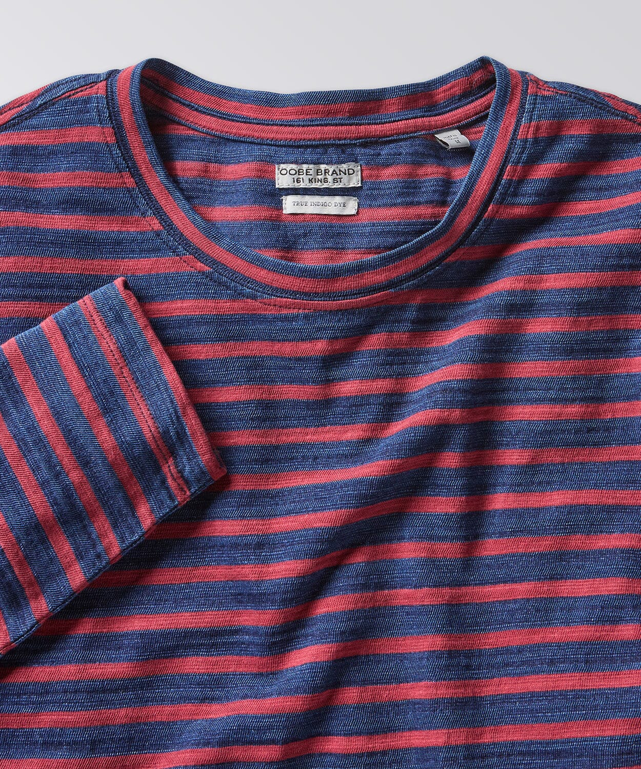 front of a mens striped tee