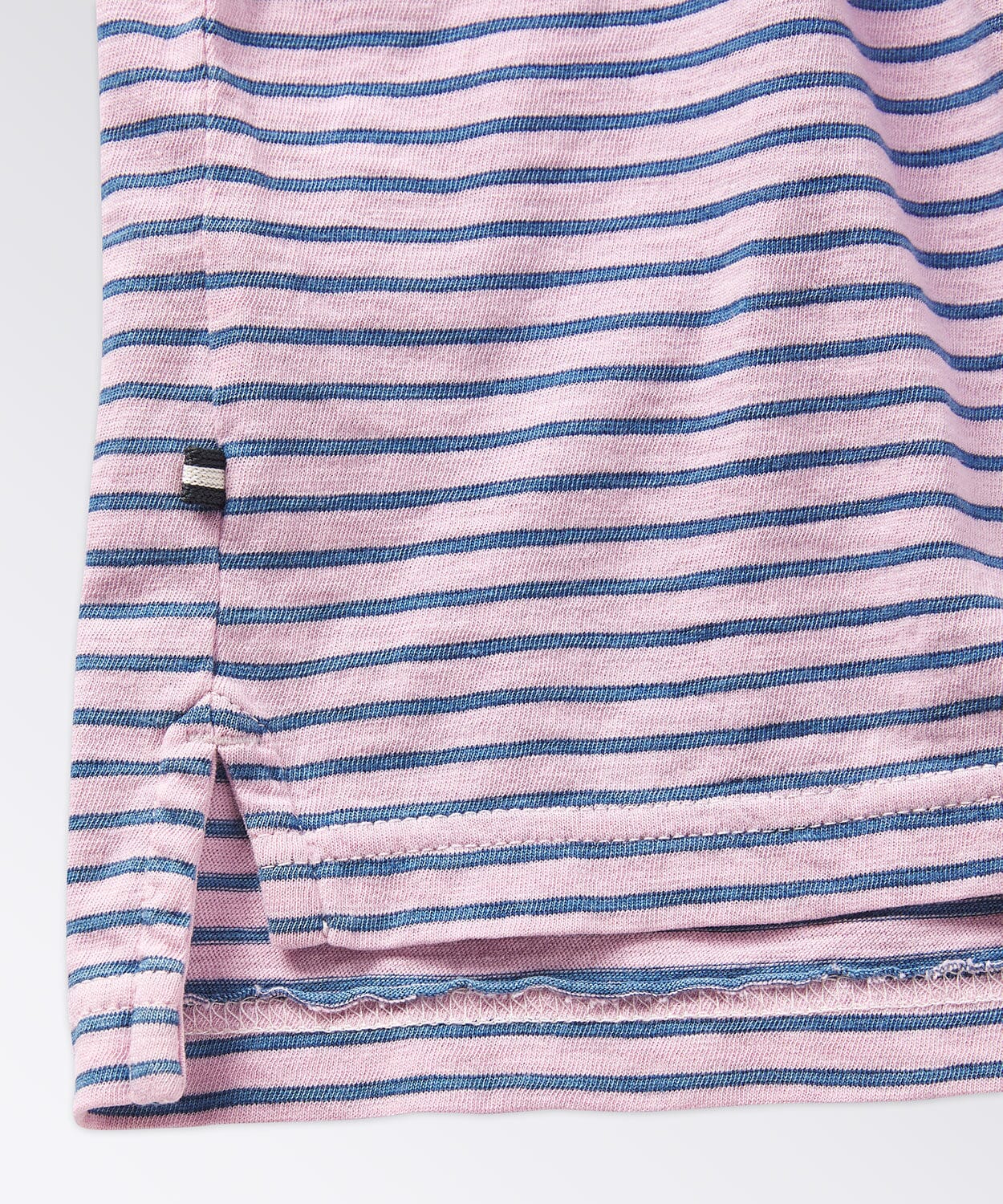 detail of a striped polo shirt
