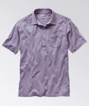 front of a striped polo shirt