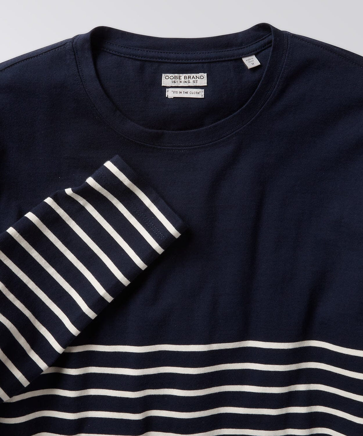 front of a striped shirt for men