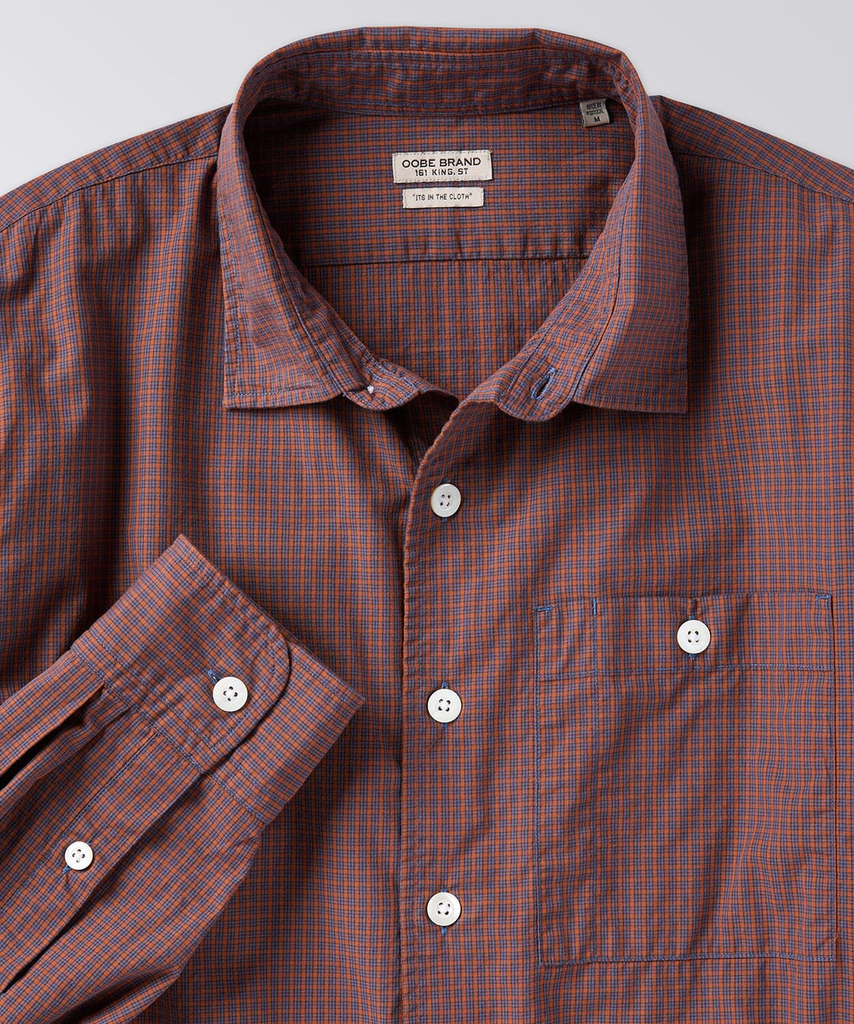 front of a mens button down shirt