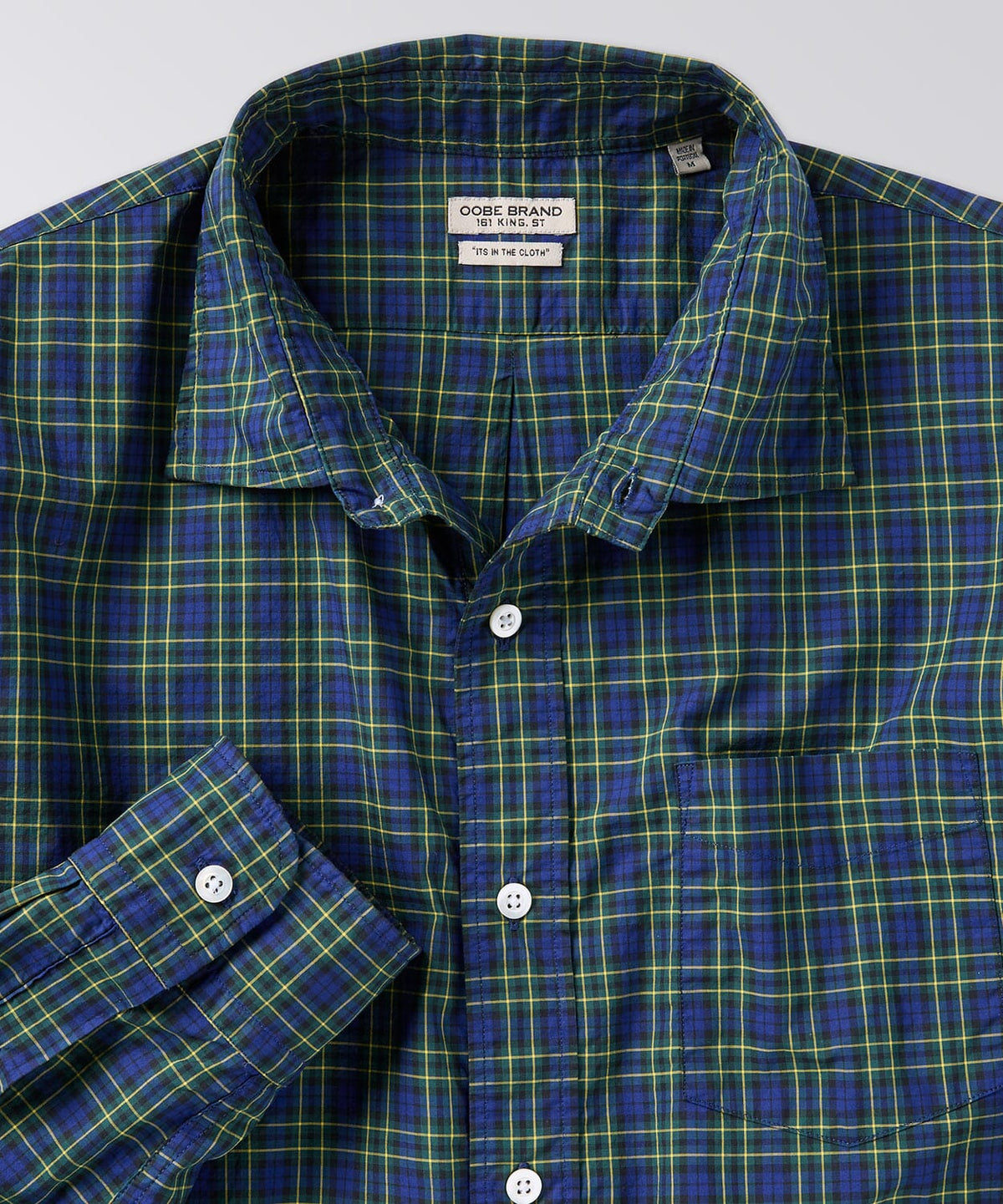 front of a mens plaid button down shirt