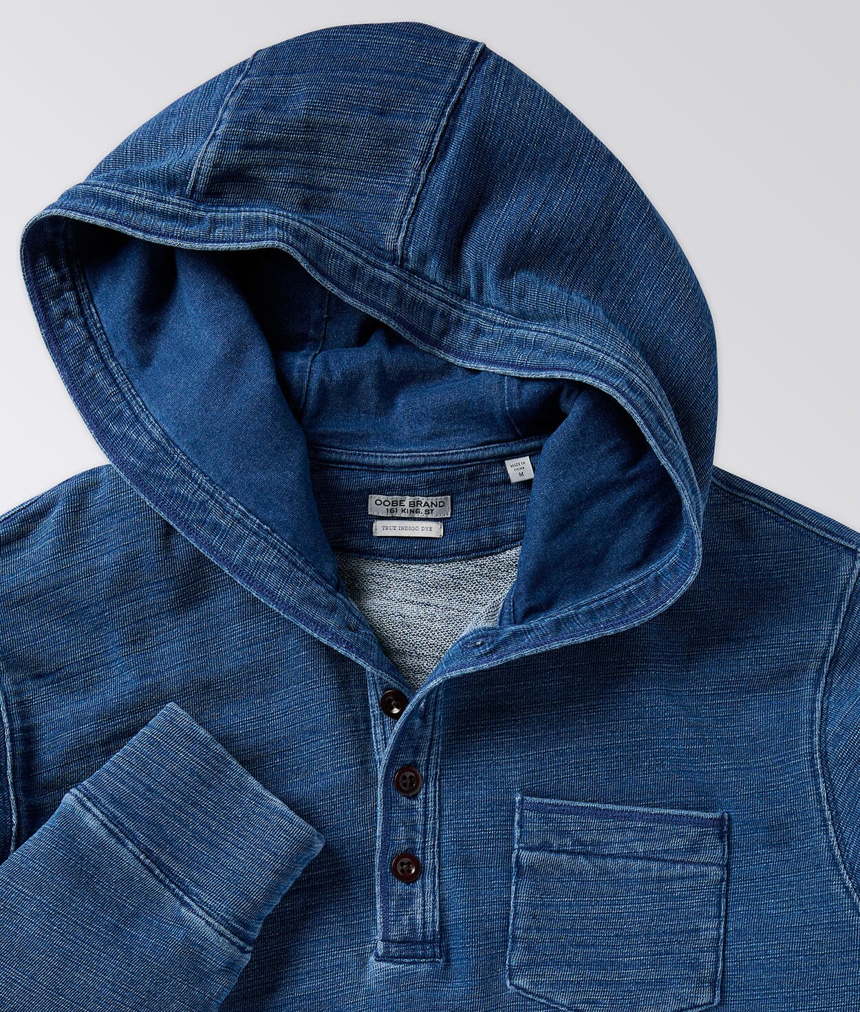 Close up of Paneled Hood with Button Placket